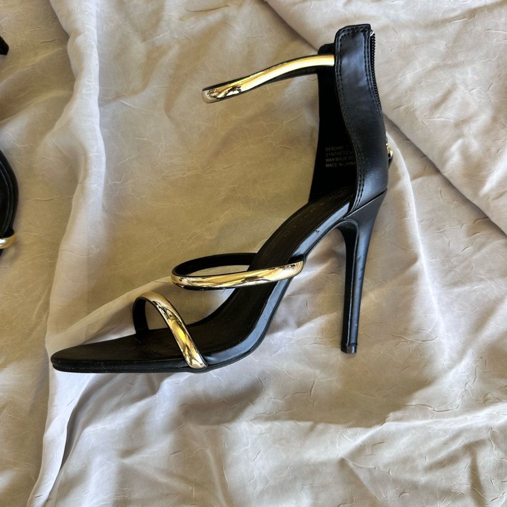 bebe Black and Gold Strappy Heels